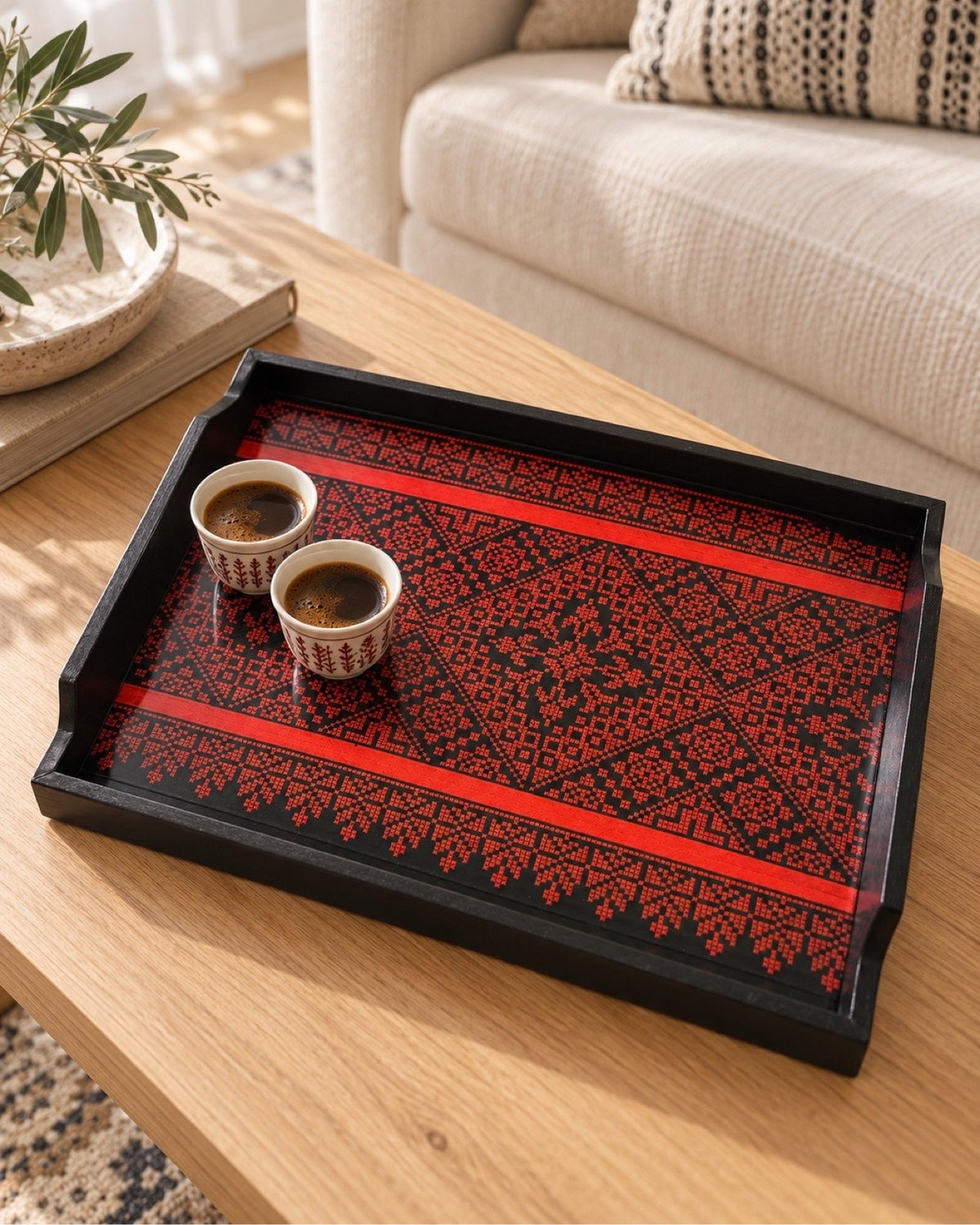 Palestinian tatreez wooden tray with two coffee cups on a coffee table